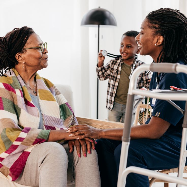 Family caregiver visiting and supporting an elder at home