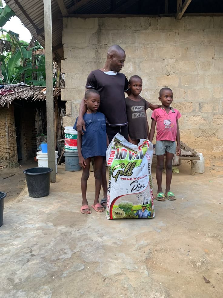 Father and children receiving food support
